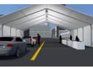 40ft x 50ft drive-through tent rental in Houston with vehicle lane and staff setup, ideal for curbside delivery and large events