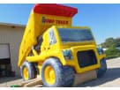 Dump truck bounce house rental in Austin with wet and dry combo—ideal for San Marcos kids' parties.