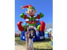 Perfect for Lewisville holiday parties, this Elf bounce house rental in Dallas features oversized boxing gloves and festive red