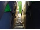 Medieval castle bounce house rental in Austin with dual slide lanes, ideal for Round Rock birthday parties.