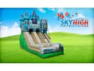 Medieval castle bounce house rental in Houston with dual slides, ideal for Conroe birthday parties.