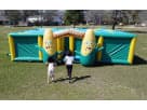 Corn maze inflatable obstacle course rental in Dallas with dual climbing features and slide sections, ideal for outdoor parties