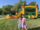 Fiesta bounce house rental in Austin with dual slides—perfect for Round Rock birthday parties.