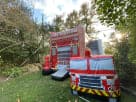 Fire station bounce house rental in Houston with wet or dry slide option, ideal for Pearland birthday parties.