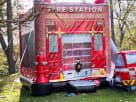 Perfect for Houston birthday parties, this fire station bounce house rental features a wet or dry water slide combo ideal for all