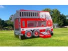 Red and white fire truck bounce house rental in Houston, ideal for Kingwood parties and outdoor celebrations.