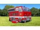 Red and white fire truck bounce house rental in Houston holds 6-8 kids—ideal for fireman-themed birthday parties in Spring.