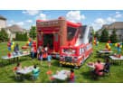 Fire station bounce house with attached water slide rental in Austin — perfect for all-ages birthday parties in Leander.