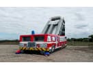 Fire Truck Slide bounce house rental in Dallas with tall slide tower, ideal for Garland birthday parties.