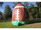 Football bounce house rental in Austin park setting, holds up to 5 kids, ideal for Cedar Park parties.
