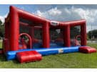 Renta de Wipe-Out Challenge con obstáculos ideal para fiestas en Dallas y Garland, inflable rojo y azul con techo de malla.