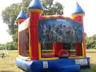 13x13 Fortnite bounce house rental in Dallas with castle towers, perfect for McKinney birthday parties and events.