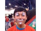 Purple and white character face painter rental in Houston with oversized inflatable design, ideal for Spring birthday parties.