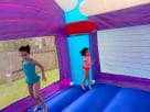 Frozen 2 bounce house rental in Dallas with wet or dry slide, ideal for Grand Prairie parties.
