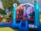 Frozen-themed bounce house combo with attached slide rental, perfect for Pflugerville birthday celebrations.