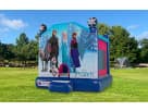 Frozen bounce house rental in Austin park with dual soccer toppers, ideal for princess parties—holds 6-8 kids.
