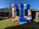 13x13 balloon-themed bounce house rental in Austin, perfect for kids' birthday parties in Leander with spacious jumping area