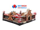 Gingerbread Wonder Playland bounce house rental in Dallas with candy cane details and multiple play areas, ideal for McKinney