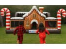 Perfect for Dallas holiday parties, this gingerbread-themed bounce house rental features interactive popups and a slide