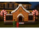Perfect for Dallas holiday parties, this gingerbread bounce house rental features a slide and interactive popups