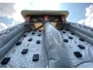 Dual-lane Black Ops obstacle course rental in Dallas with rock wall, rocking bridge, and slides—ideal for Irving parties.