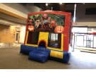 Halloween-themed 13x13 bounce house rental in Dallas with spooky jack-o'-lanterns, ideal for Plano parties and church festivals.