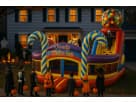 Candy-themed bounce house rental in Dallas with dual slides, perfect for kids' birthday parties in Grand Prairie.