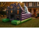 Haunted House Maze bounce house rental in Houston with purple and green Victorian styling, ideal for all-ages church festivals