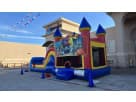 Halloween bounce house rental in Houston with dual slides, ideal for church festivals and Kingwood parties.