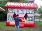Hello Kitty bounce house rental in Dallas with water slide, perfect for Lewisville birthday parties and kids' events.