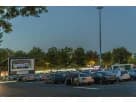 Large outdoor inflatable movie screen rental in Austin, ideal for drive-in events in Round Rock with projector and speakers