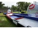 Red, white, and blue hamster ball obstacle course rental in Dallas with dual rolling balls, ideal for ages 4 and up at backyard