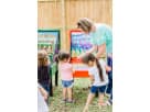 Interactive Down A Clown carnival game rental in Dallas with colorful ring toss booth, ideal for Garland birthday parties