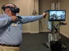 Man demonstrating virtual reality gaming rental in Austin with Oculus Rift headsets and motion controllers ideal for corporate