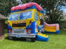 Ice Cream Truck bounce house rental in Austin with attached slide, ideal for Buda birthday parties and outdoor events.