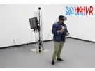 Man demonstrating VR headset with motion controllers in Austin virtual reality rental setup ideal for Georgetown events.