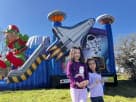 Perfect for Houston birthday parties, this space-themed bounce house rental features a rocket slide and fits 6-8 kids for jump