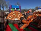 Gingerbread Wonder Playland bounce house rental in Dallas with indoor and outdoor play structures, perfect for Grand Prairie