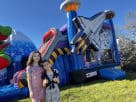 Perfect for Houston birthday parties, this space-themed bounce house rental features dual slides and holds up to 8 kids