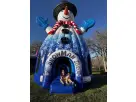 Renta de castillo inflable Snowmageddon en Austin con diseño azul y copos de nieve, perfecto para fiestas en Kyle.