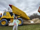 Dump truck bounce house with slide rental in Dallas, wet or dry setup ideal for Fort Worth kids' parties.
