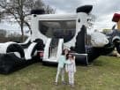 Cow Belly Bounce House Combo with climbing grip features available for rental in Austin—ideal for Round Rock birthday parties.