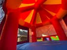 Perfect for Georgetown birthday parties, this Disney-licensed Toy Story 4 carousel bounce house rental in Austin features vibrant