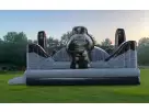 Perfect for Austin birthday parties, this space-themed bounce house rental features dual slides and holds up to 4 kids.