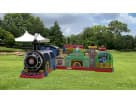 Train-themed obstacle course rental in Dallas with attached building structure, ideal for kids' birthday parties in Irving.