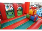 Perfect for Irving holiday parties, this Christmas Candy Cane bounce house rental in Dallas features dual tunnel entrances