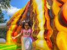 Perfect for toddler birthday parties in Dallas, this dinosaur-themed obstacle course rental features a slide, ball pit