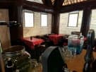 Perfect for Houston fundraisers and college events, this inflatable Pub rental features a charming bar setup with red polka-dot