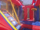 Disney 4in1 combo bounce house with wet or dry slide rental in Dallas, ideal for Irving birthday parties.
