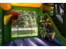 Perfect for The Woodlands kids' parties, this Ninja Turtle bounce house rental in Houston features dual water slides and colorful